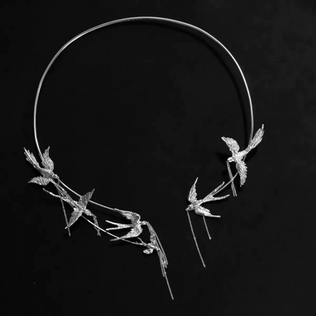 Even a passing swallow leaves its trace.--Chinese-style silver necklace